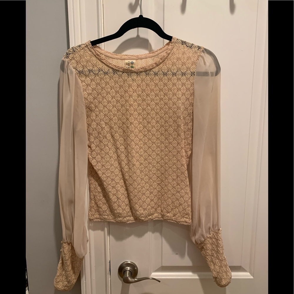 Free People long sleeve cream blouse.